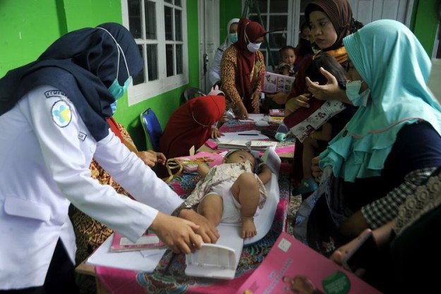 Mereka yang Menjaga Kesehatan Warga dari Lingkungan Terkecil
